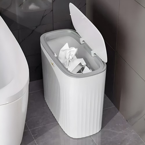 Small narrow waste bin with - waste,